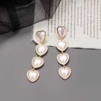 Fashion Long Heart Shaped Full Pearl Alloy Drop Earrings Wholesale main image 2