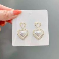 Pendientes Tridimensionales De Aleación De Perlas En Forma De Corazón De Doble Capa De Moda sku image 1