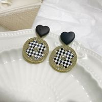 Fashion Simple Black And White Four-leaf Flower Alloy Earrings sku image 2