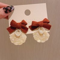 Autumn And Winter New Pearl Shell Bow Alloy Earrings main image 5