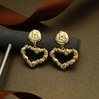Vintage Solid Color Hollow Heart Shaped Fold Irregular Copper Earring Wholesale main image 3