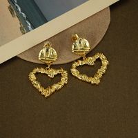 Vintage Solid Color Hollow Heart Shaped Fold Irregular Copper Earring Wholesale main image 4
