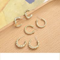 Retro Alloy C-shaped Twisted Irregular Geometric Stud Earrings Wholesale main image 1