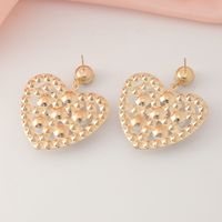 Fashion Hollow Heart Shaped Inlaid Pearl Diamond Metal Drop Earrings main image 4