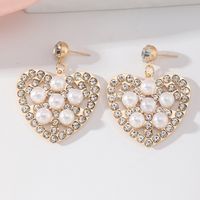 Fashion Hollow Heart Shaped Inlaid Pearl Diamond Metal Drop Earrings main image 5