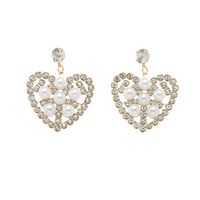 Fashion Hollow Heart Shaped Inlaid Pearl Diamond Metal Drop Earrings main image 6
