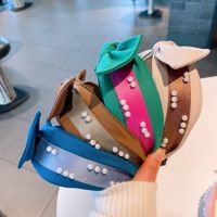 Retro Inlaid Pearl Bow Contrast Color Wide Headband Wholesale main image 2
