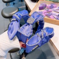 Fashion Solid Color Purple Inlaid Rhinestone Bow Shaped Headband Wholesale main image 1