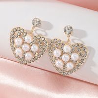 Fashion Hollow Heart Shaped Inlaid Pearl Diamond Metal Drop Earrings sku image 1