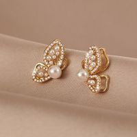 Style Coréen Papillon Alliage Perles Artificielles Boucles D'Oreilles main image 1
