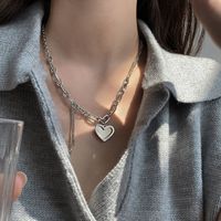 Vintage Tassel Heart Pendant Hollow Chain Titanium Steel Necklace Wholesale main image 1