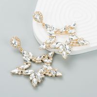 Alliage De Mode Diamant Strass Boucles D&#39;oreilles Étoiles Irrégulières Femme En Gros main image 3