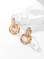 Fashion Carved Round Car Flower Copper Hoop Earrings main image 1