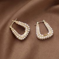 Fashion Geometric U-shaped Pearl Ear Buckle Simple Alloy Earrings Wholesale main image 1