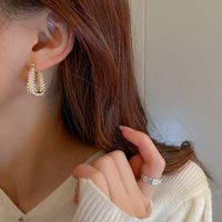 Fashion Geometric U-shaped Pearl Ear Buckle Simple Alloy Earrings Wholesale main image 5