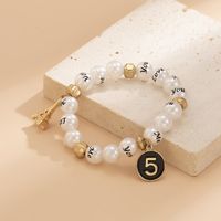Imitation Pearl Weaving Hand Beaded Simple Letters Retro Leaning Tower Alloy Bracelet main image 5