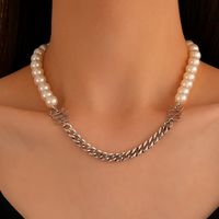 Fashion Retro Asymmetric Pearl Stitching Necklace Simple Alloy Collarbone Chain main image 1