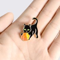 Creative Cartoon Black Cat Holding Ball Shape Alloy Brooch Clothes Badge Wholesale main image 4