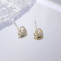 Pendientes De Botón De Mujer De Metal De Diamantes De Imitación De Corazón Hueco De Oro De Moda Clásica main image 4