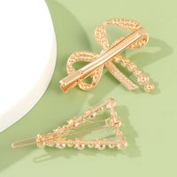2-teiliges Mode-goldenes Vintage-perlen-strass-bogen-dreieck-haarspangen-set Für Frauen main image 3