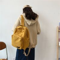 Simple College Style Solid Color Canvas Backpack Wholesale 30*11*34cm main image 3