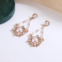 New Retro Hollow Geometric Baroque Pearl Alloy Long Earrings main image 2