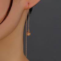 A Pair Of New Hollow Cage Copper Zircon Pendant Tassel Pierced Ear Line Earrings sku image 1
