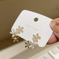 Simple Inlaid Zircon Pearl Flower Shaped Alloy Earrings Wholesale main image 3