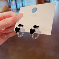 Korean Style Doble Heart Shaped Drip Oil Alloy Stud Earrings Wholesale main image 1
