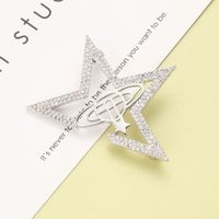 Simple Geometric Star Inlaid Zirconium Copper Brooch main image 3