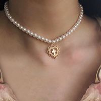 Retro Hollow Heart Cross Pendant Pearl Necklace Female main image 2