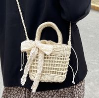Simple Hollow Flower Bow Woven Straw Messenger Bag 15*18*8 main image 1