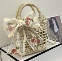 Simple Hollow Flower Bow Woven Straw Messenger Bag 15*18*8 main image 3