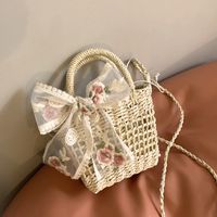 Simple Hollow Flower Bow Woven Straw Messenger Bag 15*18*8 main image 4