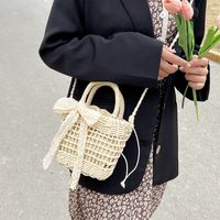 Simple Hollow Flower Bow Woven Straw Messenger Bag 15*18*8 sku image 1