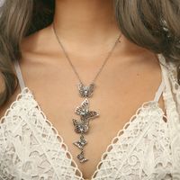 Retro Fashion Geometric Butterfly Hollow Alloy Diamond Pendant Long Necklace main image 2