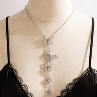 Retro Fashion Geometric Butterfly Hollow Alloy Diamond Pendant Long Necklace main image 3
