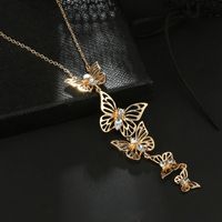Retro Fashion Geometric Butterfly Hollow Alloy Diamond Pendant Long Necklace sku image 1
