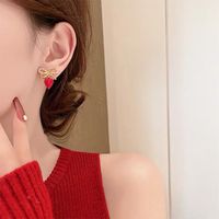 Korean Style Heart Shaped Hollowed Bows Alloy Stud Earrings Wholesale main image 3