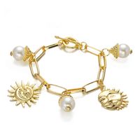 Retro Pearl Bracelet Sun Pendant Hollow Chain Alloy Bracelet main image 1