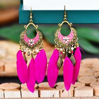 Creative Retro Fan-shaped Oil Drop Small Flower Tassel Feather Long Earrings main image 4