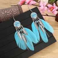 Vintage Exaggerated Round Feather Long Creative Rice Bead Carved Tassel Earrings sku image 5