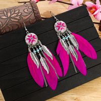 Vintage Exaggerated Round Feather Long Creative Rice Bead Carved Tassel Earrings sku image 6