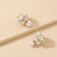 Korean Style Inlaid Zircon Pearl Flower Shaped Alloy Earrings Wholesale main image 1