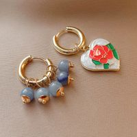 Retro Asymmetric Drip Oil Love Flower Tassel Alloy Ear Buckle Wholesale main image 4