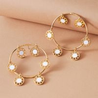 Simple Dripping Oil White Hollow Round Pendant Earrings main image 3