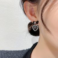 Korean Black Bow Heart Pearl Alloy Earrings Female main image 3