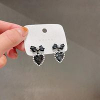 Korean Black Bow Heart Pearl Alloy Earrings Female main image 4