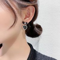 Korean Black Bow Heart Pearl Alloy Earrings Female main image 5