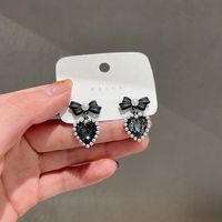 Korean Black Bow Heart Pearl Alloy Earrings Female main image 6